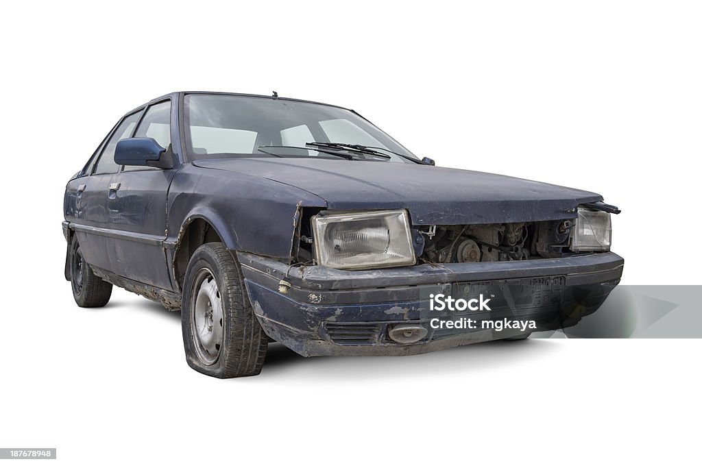 Old and Damaged Car Old and damaged blue car isolated on white background. Car Stock Photo