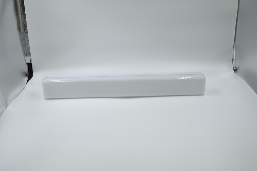 Modern indoor tube light isolated on a white background