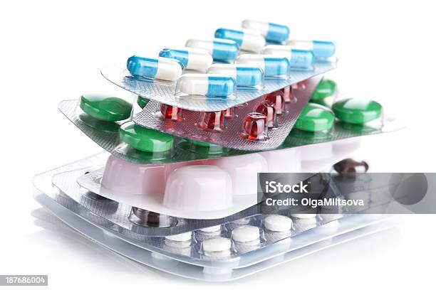 Stack Of Pill Packs Isolated Stock Photo - Download Image Now - Antibiotic, Blister, Capsule - Medicine