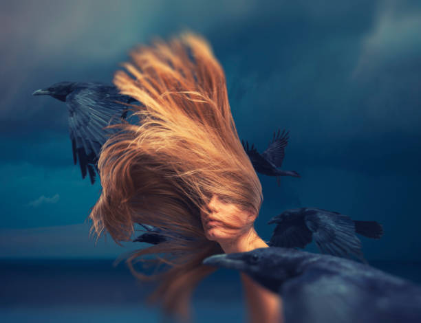 istock Young woman in motion with flying ravens 1876865882