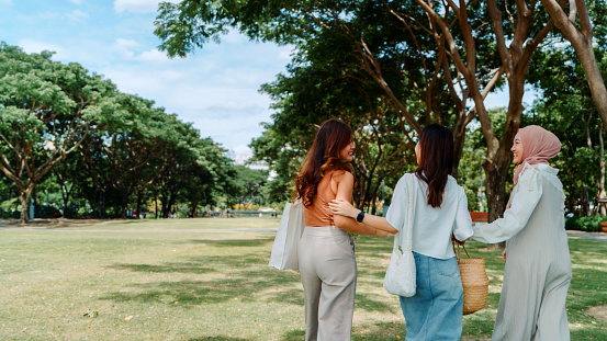 Green Conversations: Female Friends Explore the Park, Advocating for a Zero Waste Lifestyle