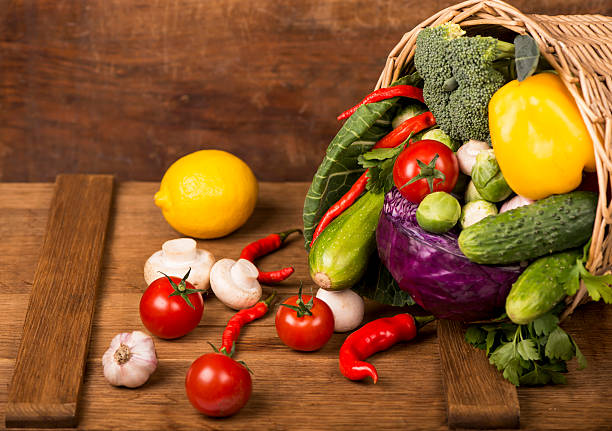 istock Healthy Organic Vegetables on a Wooden Background 187690671