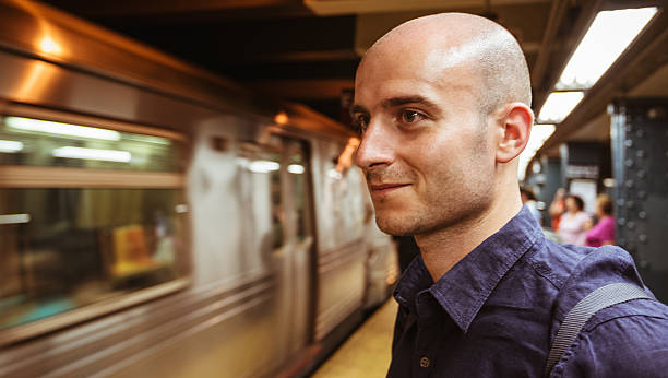 istock man waiting the nyc subway train 187691012