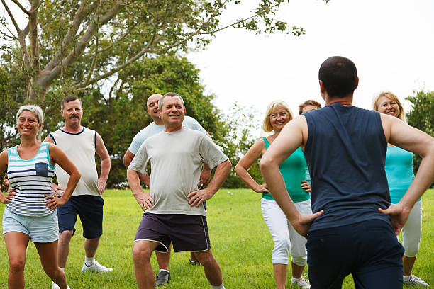 istock Active Mature People with fitness Trainer 187691656