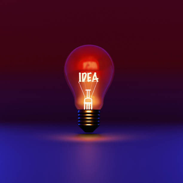 istock yellow light bulb illustration on neon black background with idea text. 1876947955