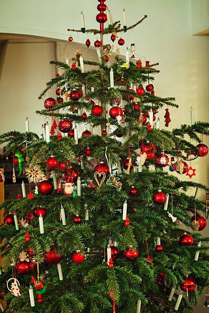 istock Close up of beautiful christmas tree with red decoration 187694932