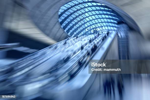 Tube Station In Canary Wharf London Stock Photo - Download Image Now - Architecture, Blue, Blurred Motion