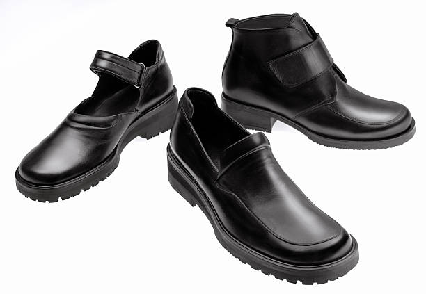 istock Three different black leather italian shoes on white background 187694968
