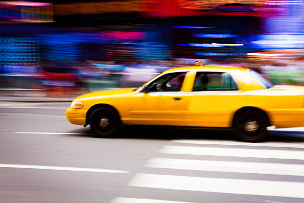 istock Speeding Yellow Cab in New York City 187695054
