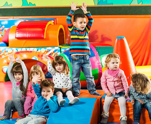 istock Cute children in a playroom. 187695998