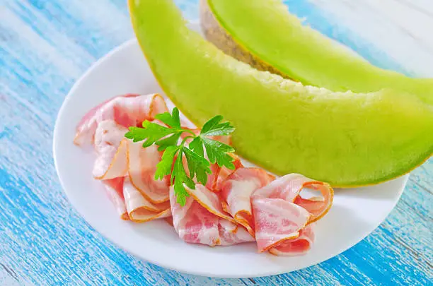 melon with ham on plate