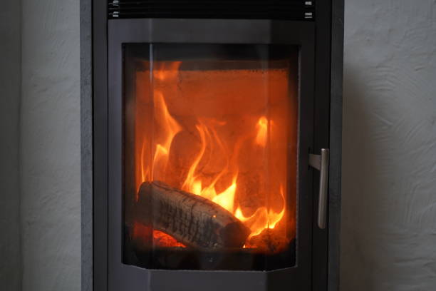 istock Fireplace, wood, cozy home 1876999776