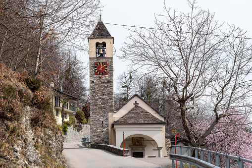 View of the San Lorenzo church between Camedo and Borgnone on the Centovalli road, Ticino, Switzerland