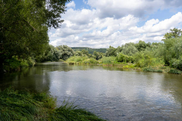 istock river in the mountains with blue sky 1877011270