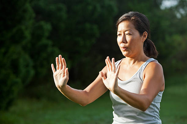istock Mature woman doing relaxation exercises 187701614