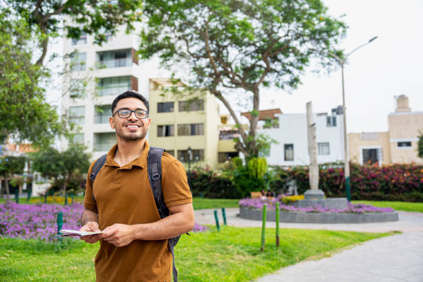 istock Young Latin American man sightseeing in Parque Larco, Peru 1877017182
