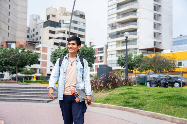 istock Young Peruvian man taking a walk in Parque del Amor, Miraflores, Peru 1877025619