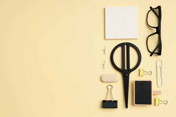 istock Mockup flat lay with different office accessories on beige background 1877027720