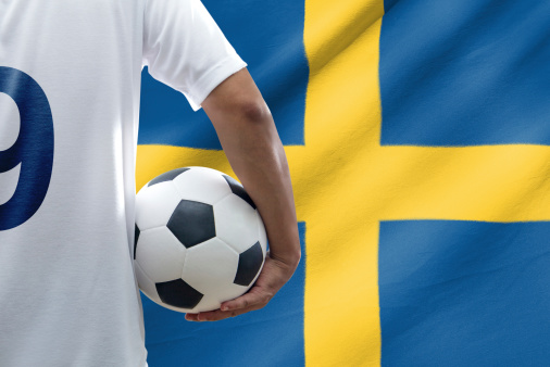 Soccer player with sweden flag