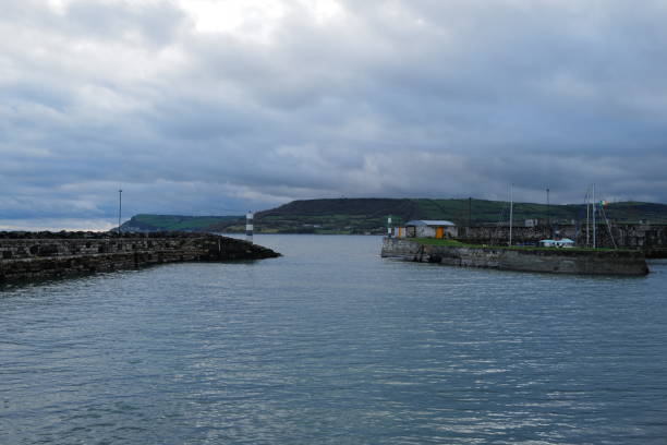 istock Gateway to the Sea: A Northern Irish Harbor Entrance 1877066579