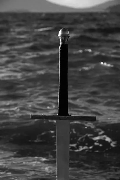 A sword near the ocean