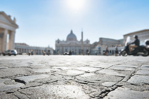 istock cobblestone on st. peter's square 187709460