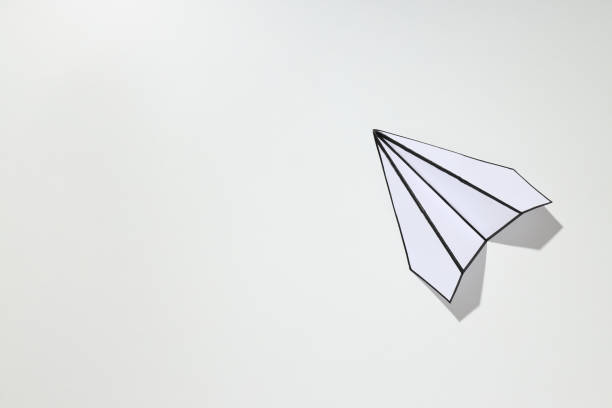 istock Business, startup and sponsorship concept with paper plane on white background 1877112238