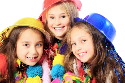 Group of little girls in carnival costumes