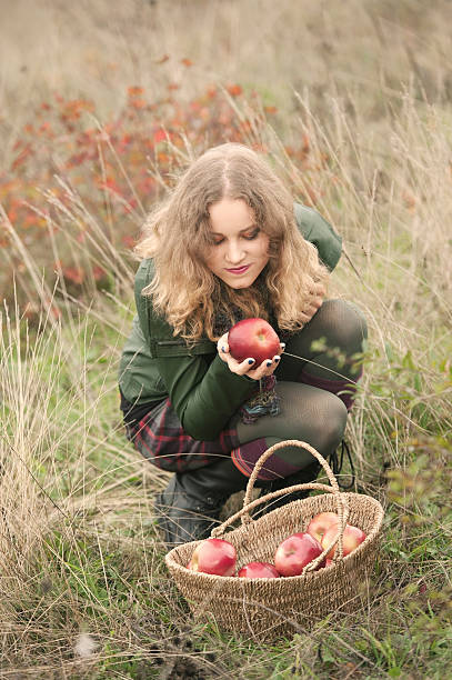istock Woman with Red Apples 187715336