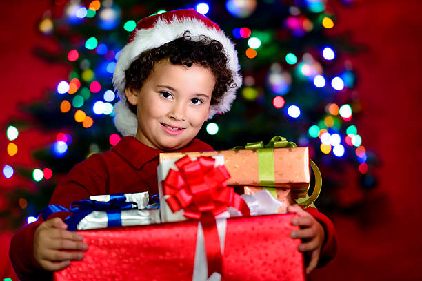 istock Child and christmas gifts 187715701