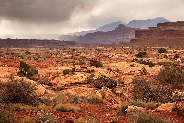istock Rain falls over Glen Canyon National Recreation Area Utah 187715755