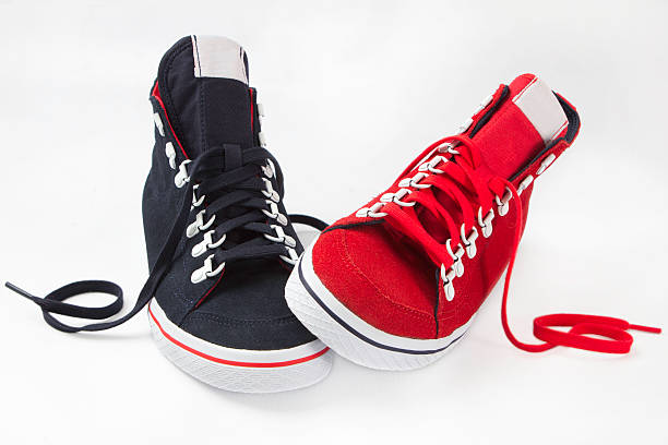istock Red and blue shoes on white background 187716492