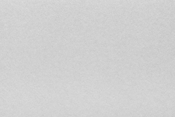 istock Textured glossy gray paperboard background. Horizontal scabrous cardboard background 1877193807