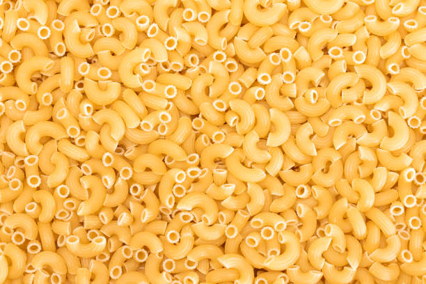 istock Uncooked Chifferi Rigati Pasta Background 1877194198