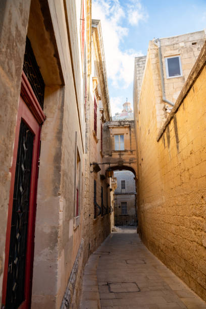 istock Ancient narrow medieval street, town Mdina, Malta 1877195626