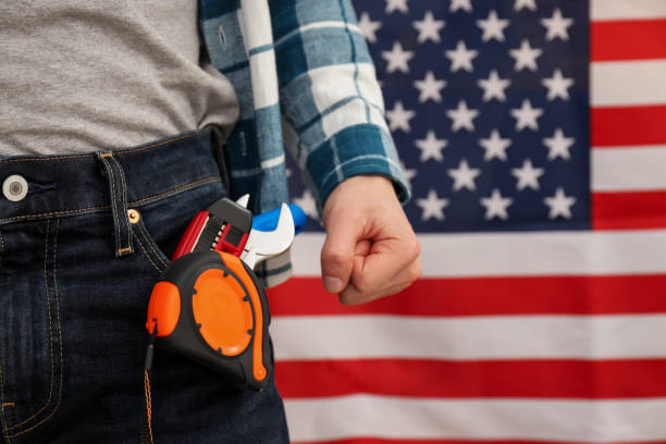 istock Engineer and construction tools on background of American flag, space for text 1877219957