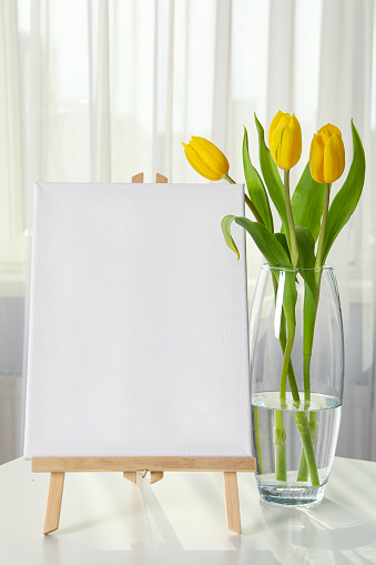 A wallboard with a canvas on the table