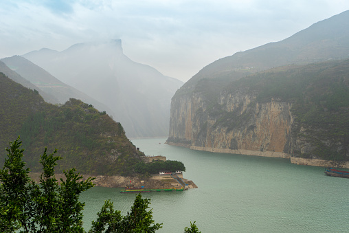 View of the Three Gorges of the Yangtze River from Baidicheng, Chongqing. The Yangtze River meanders through canyons with sheer cliffs on both sides.