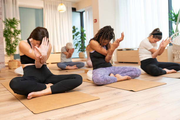 istock Group of women at yoga class 1877275018