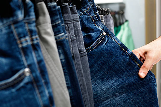 blue jeans - pants hanger hanging clothing foto e immagini stock