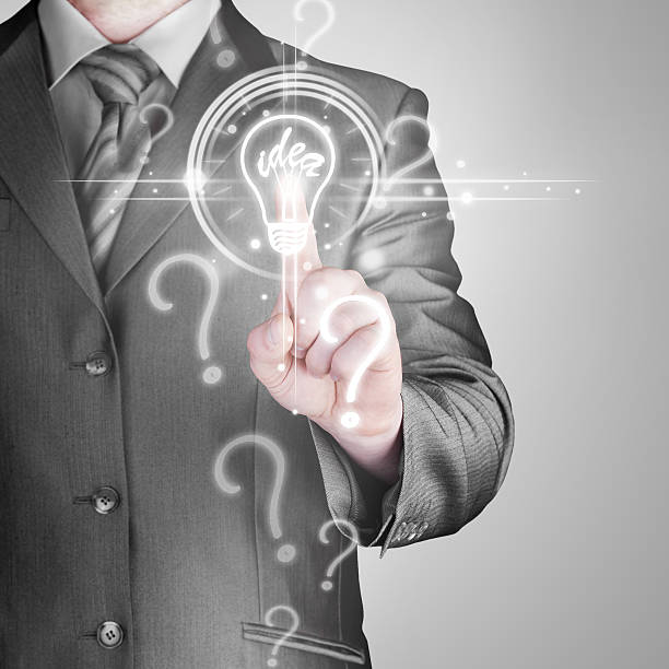 istock Business man touching light of idea 187729285