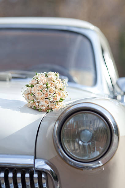 istock Wedding bouquet on vintage car 187729780
