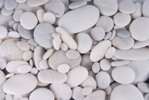 Pebbles on white background