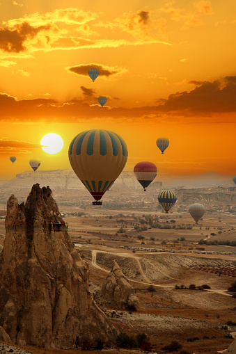 Flying hot air balloons in Cappadocia at sunset. nevsehir,Turkey