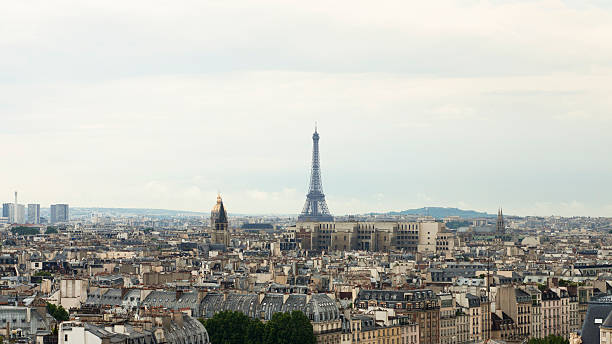 istock Paris skyline and the Eiffel Tower and Parisian rooftops 187742931
