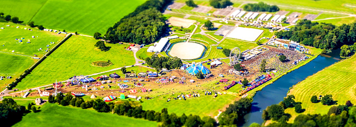 A Circus or Funfair seen from an aircraft flying overhead.