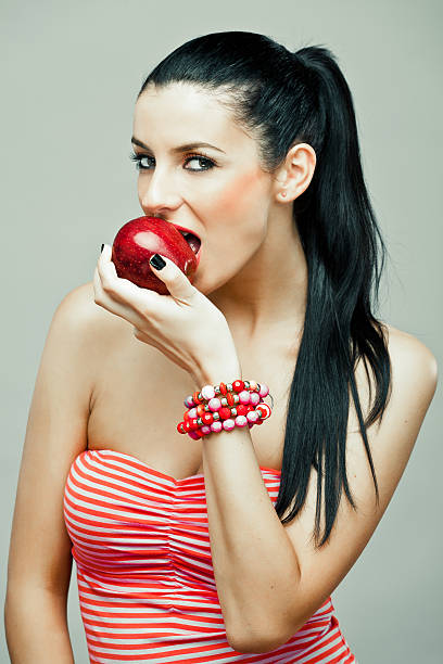 istock Black haired girl with Fresh fruits 187743073