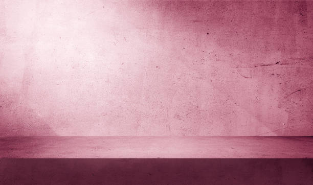 istock cosmetic beauty presentation background. minimal abstract pink concrete background with light for product displayed. shadow and light from windows on rustic plaster wall. Valentines concept backdrop. 1877444453