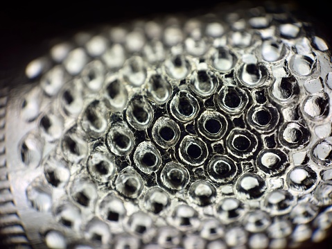 extreme close up of sewing thimble