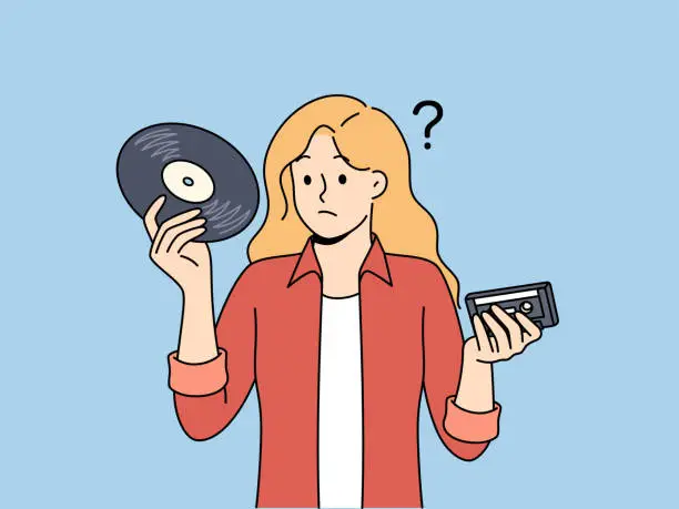 Vector illustration of Girl with vinyl record and tape cassette looks confusedly at old-fashioned storage media with music